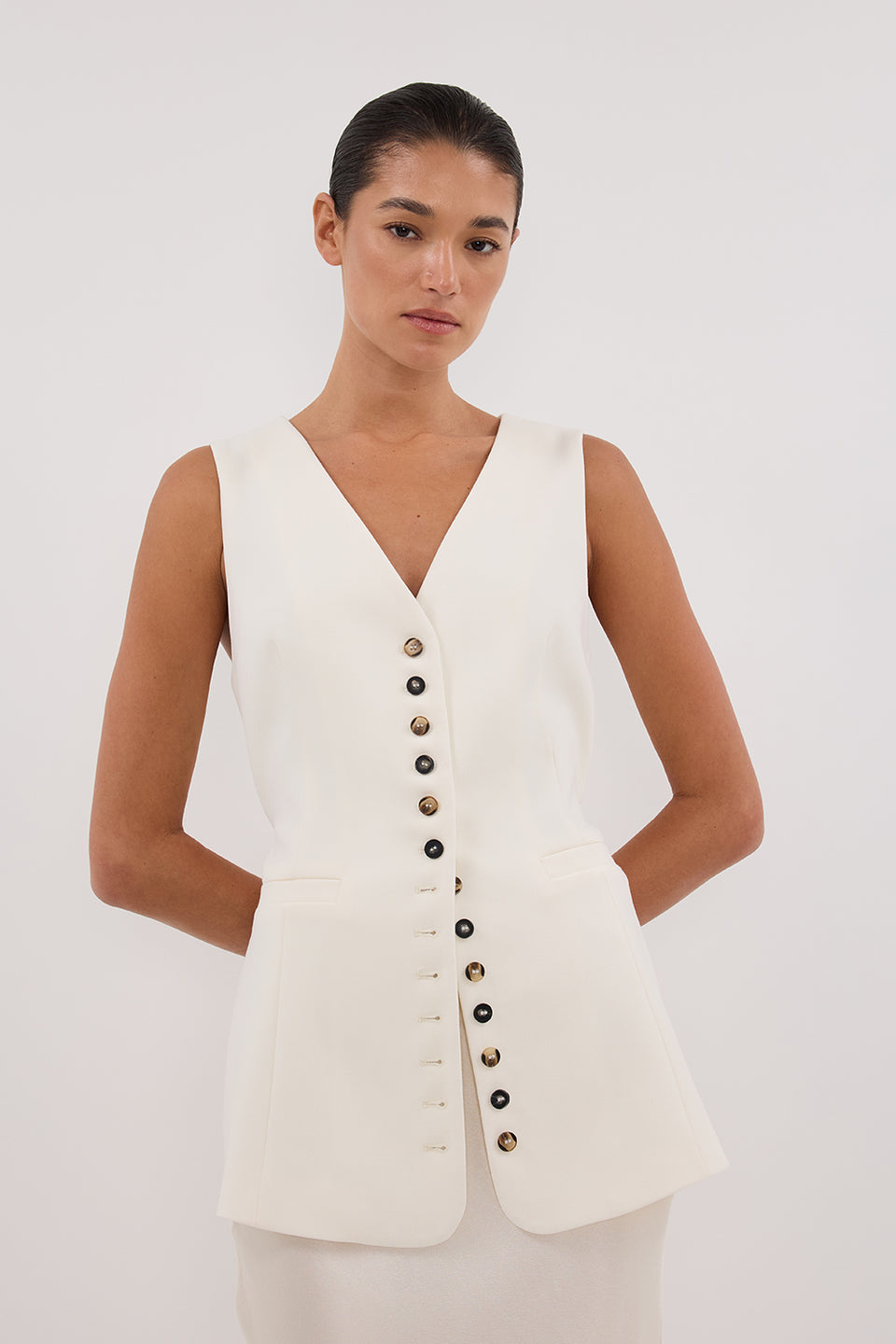 DEMI CREAM LONGLINE VEST Clothing DISSH Boutiques