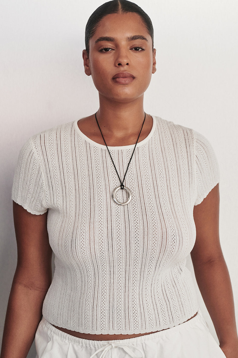 ELENA WHITE POINTELLE KNIT BABY TEE