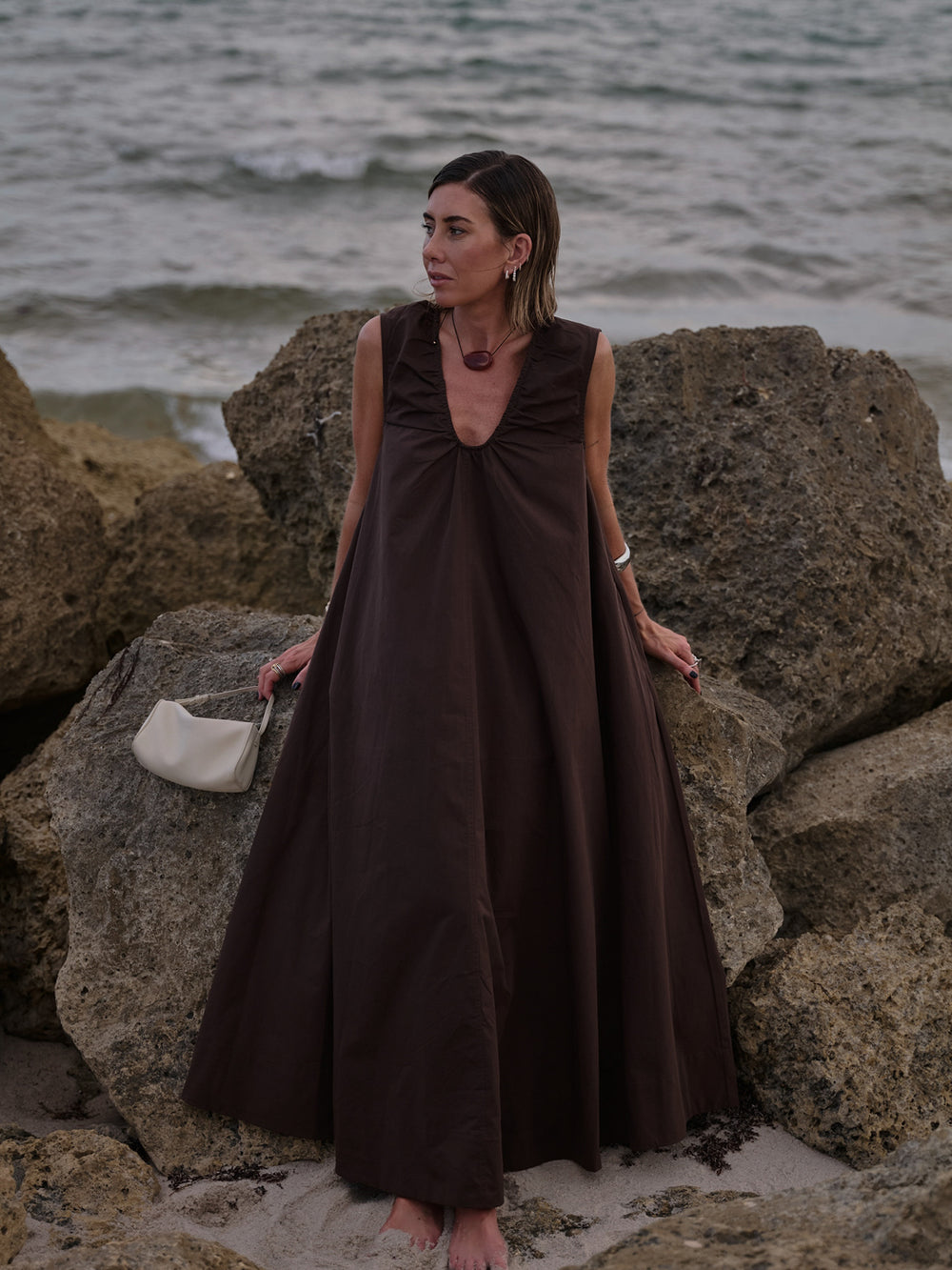 @hannahlewisstylist wears the Gabby Bitter Choc Cotton Midi Dress