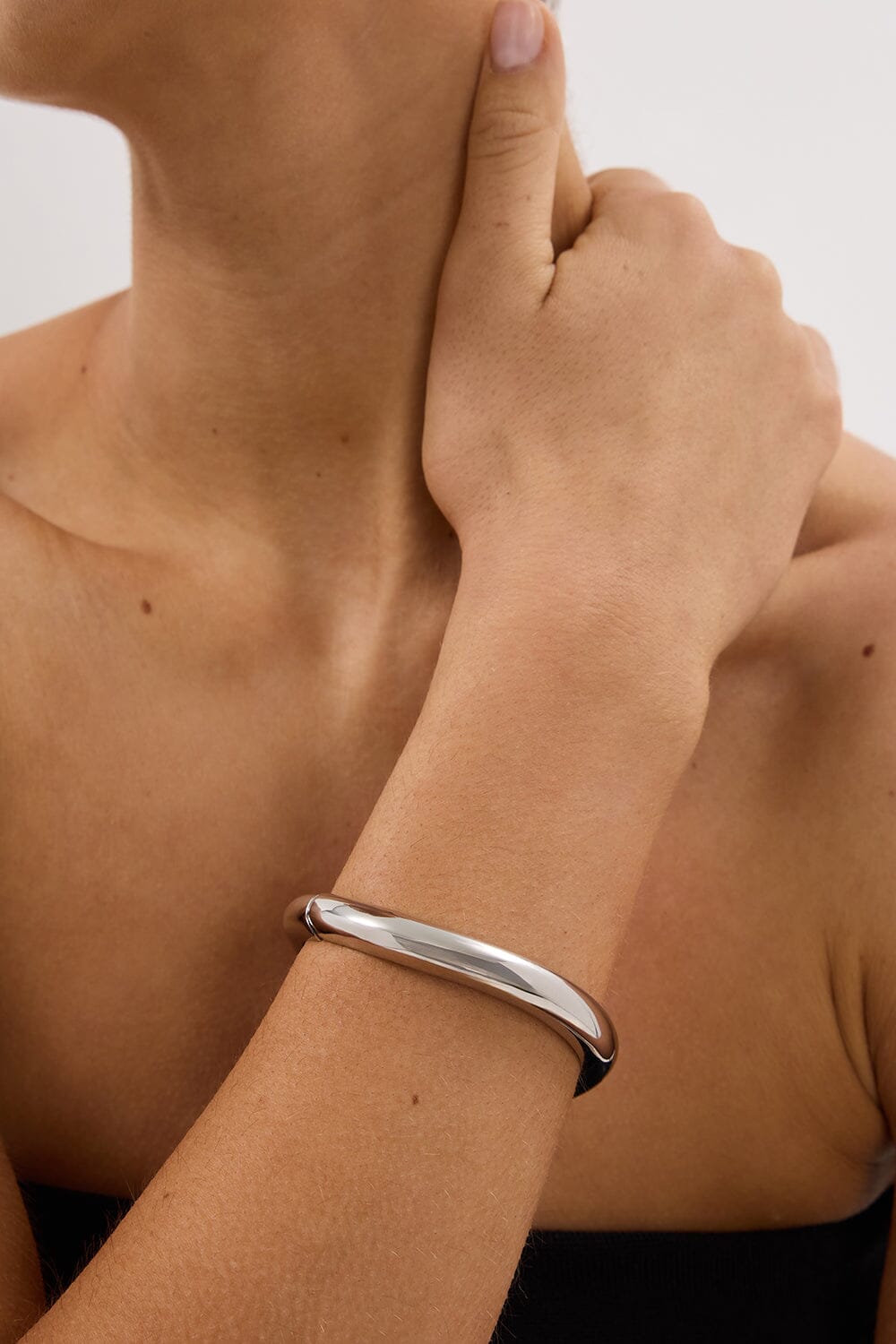 ANNA ROSSI THIN WARPED BANGLE SILVER Accessories DISSH Boutiques 