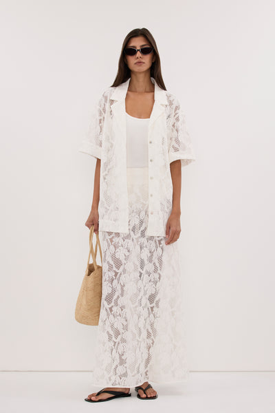 Aida wearing LUCINE WHITE LACE MAXI SKIRT