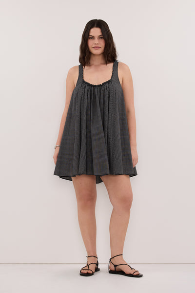 Jasmine wearing ARABELLA BLACK CHECK MINI DRESS