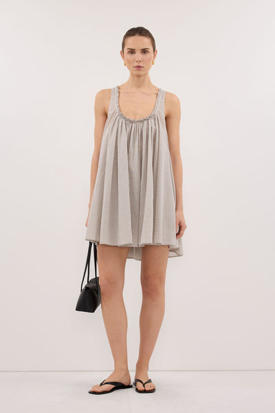Stas wearing ARABELLA CREAM CHECK MINI DRESS