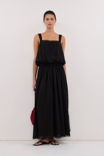 Aude wearing ROSIN BLACK SHIRRED LACE MIDI DRESS