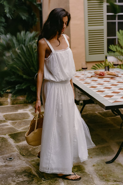 Anaya  wearing ROSIN WHITE SHIRRED LACE MIDI DRESS