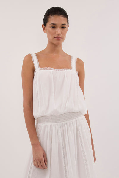 Aude wearing ROSIN WHITE SHIRRED LACE MIDI DRESS