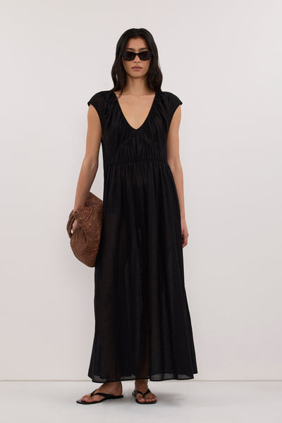 Zoey wearing BILLIE BLACK LINEN BLEND MIDI DRESS