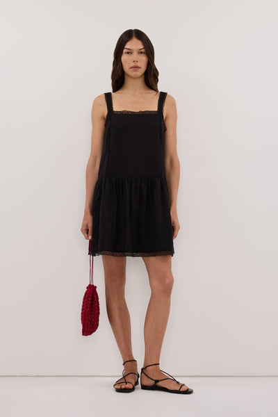 Helena  wearing ROSIN BLACK COTTON VOILE MINI DRESS