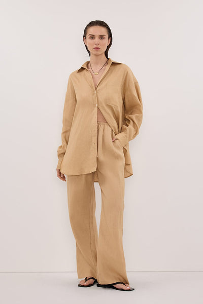 Stas wearing LUNE TAN OVERSIZED LINEN SHIRT