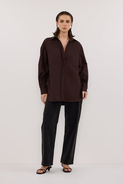 Stas wearing RHEA 2.0 BURNT CHOC OVERSIZED COTTON SHIRT