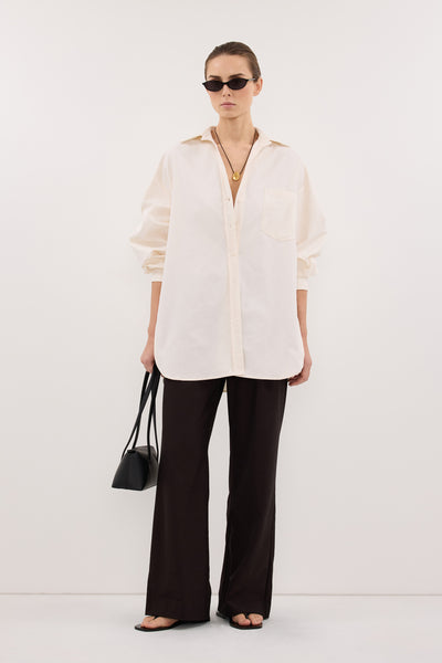 Stas wearing RHEA 2.0 CREAM OVERSIZED COTTON SHIRT