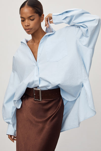Kristen wearing RHEA 2.0 ICE BLUE OVERSIZED COTTON SHIRT