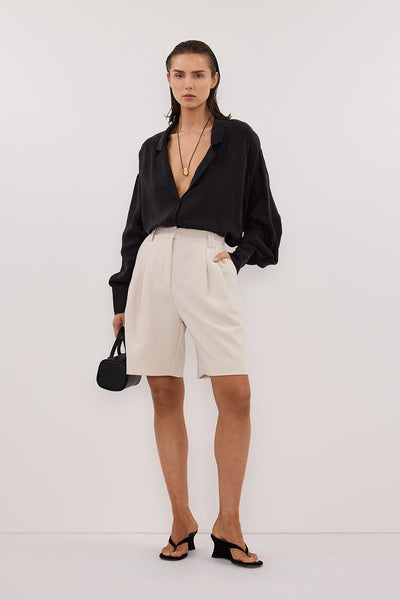 Stas wearing LUCILLE BLACK LONG SLEEVE CUPRO SHIRT