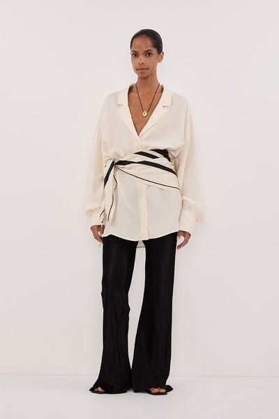Kristen wearing LUCILLE STRAW LONG SLEEVE CUPRO SHIRT