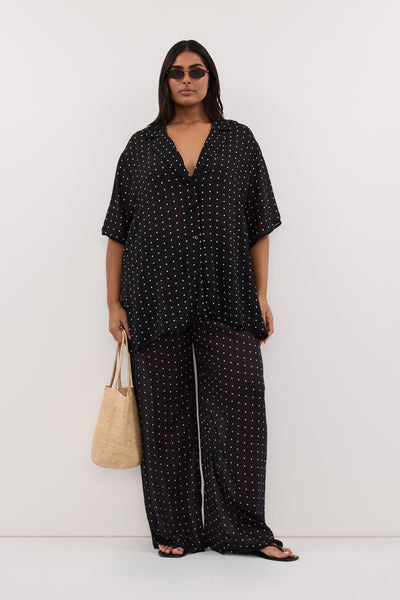 Shanaya wearing VANESSA BLACK OVERSIZED SHORT SLEEVE RESORT SHIRT