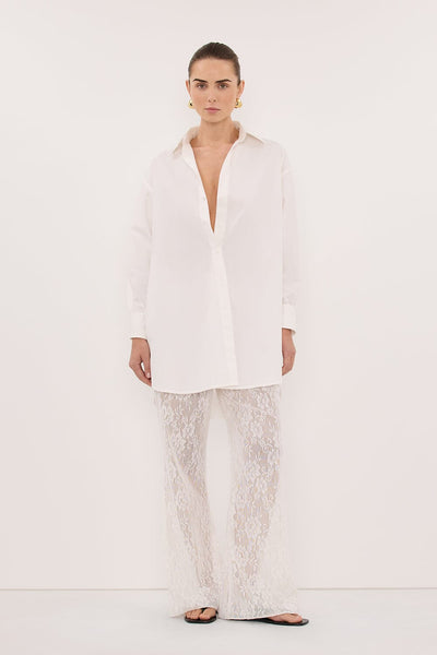 Kristen wearing LULU LONGLINE WHITE COTTON SHIRT