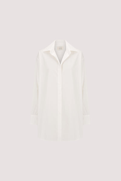 Joanna wearing LULU LONGLINE WHITE COTTON SHIRT