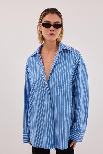 Joanna wearing MISHA AZURE BLUE STRIPE SHIRT