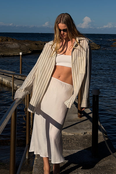 Zoe wearing FABLE CREAM SILK BLEND SHIRT