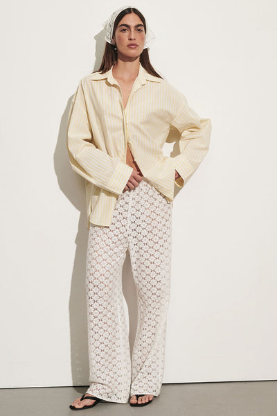 Sofia wearing DOMINIQUE YELLOW STRIPE SHIRT