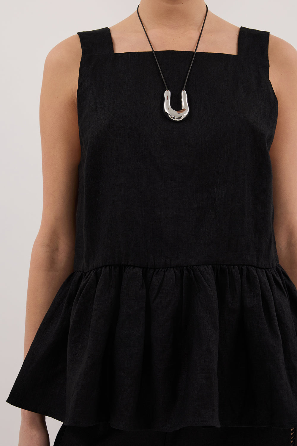 DAISY BLACK PEPLUM TOP Clothing DISSH Boutiques 