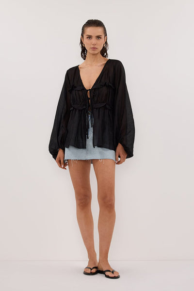 Stas wearing MILA BLACK RAMIE LONG SLEEVE FRILL TOP