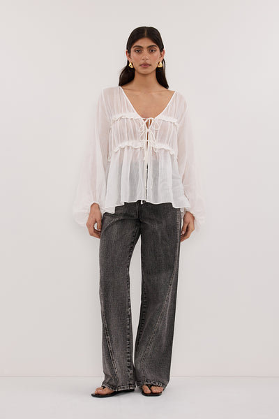 Stas wearing MILA WHITE RAMIE LONG SLEEVE FRILL TOP