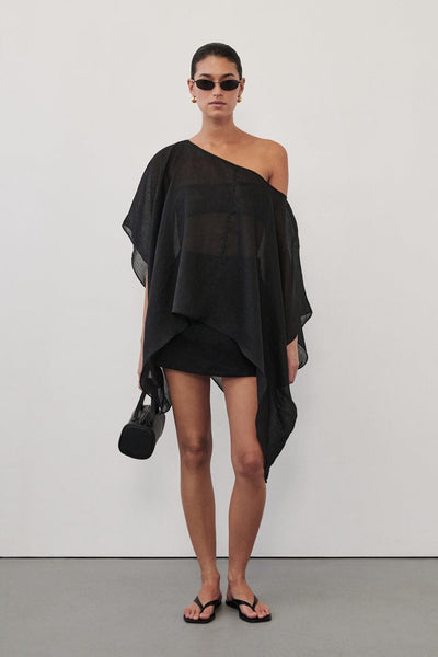 Aude wearing BRIANNE BLACK BATWING RAMIE TOP