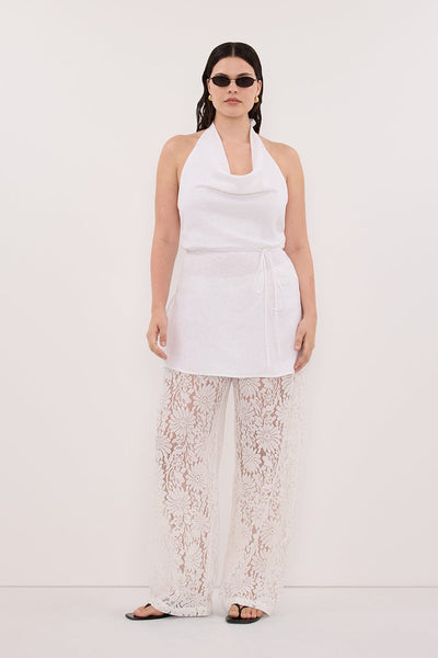 Jasmine wearing HAYLEE WHITE SLEEVELESS LINEN COWL TOP