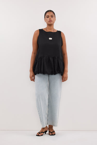 Amanda wearing ARLO BLACK RAMIE DROP WAIST TOP