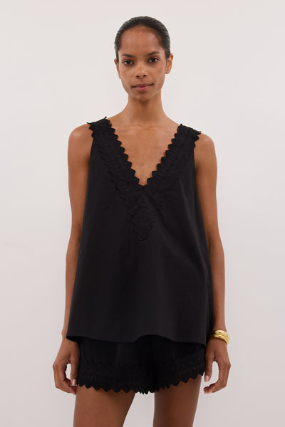 Kristen wearing ANNABEL BLACK V NECK TOP