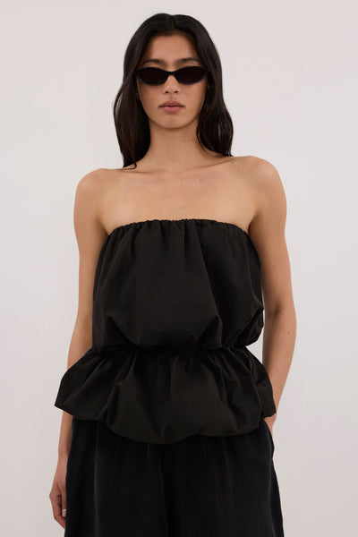 Zoey wearing MARTINA BLACK COTTON BUBBLE TOP 