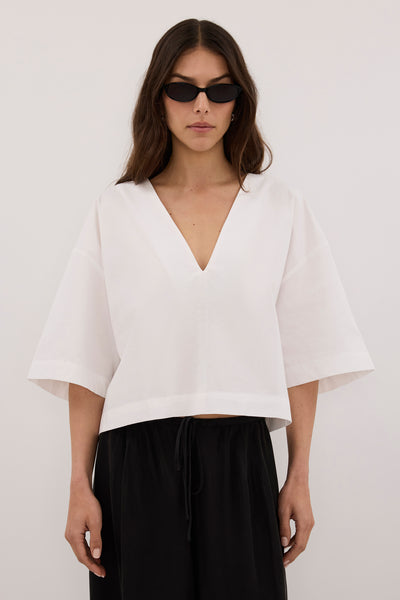 Helena  wearing ORLENA WHITE COTTON TOP