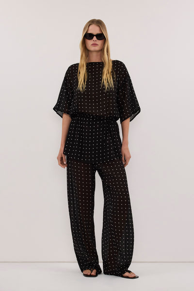 Zoe wearing VANESSA BLACK SPOT PRINT TEE