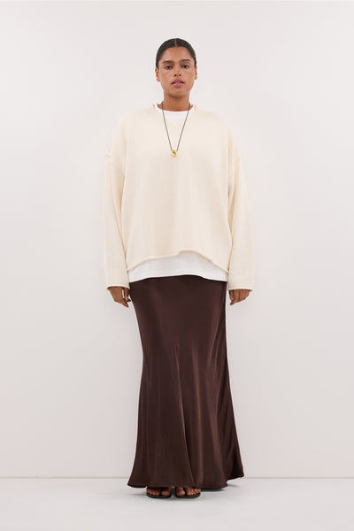 Amanda wearing CHARLI BITTER CHOC SATIN MAXI SKIRT