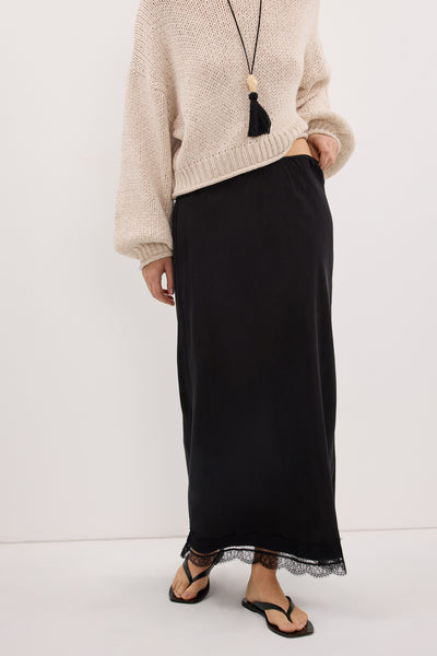 Aude wearing ANDREA BLACK CUPRO MIDI SKIRT
