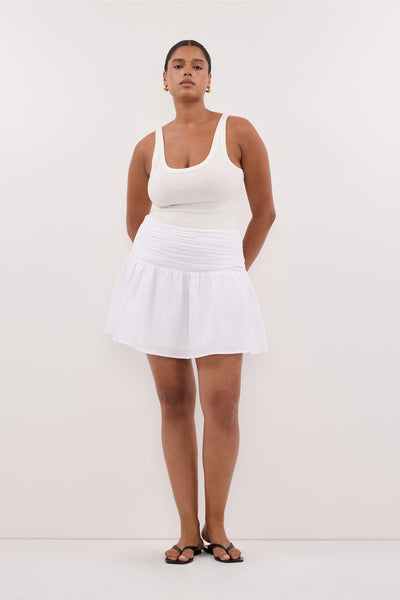 Amanda wearing CATANIA WHITE LINEN MINI SKIRT