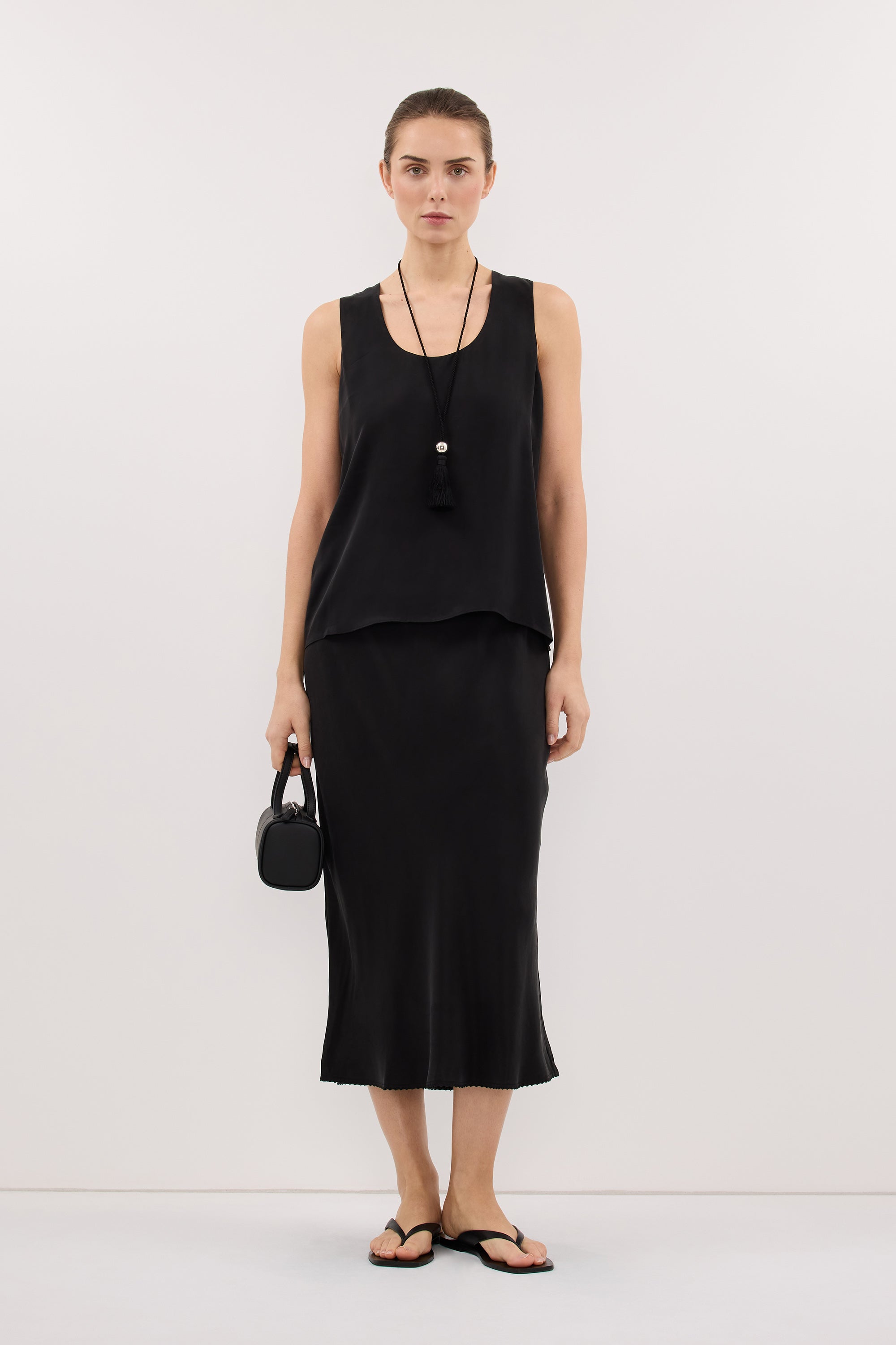 ARELIA BLACK CUPRO MIDI SKIRT