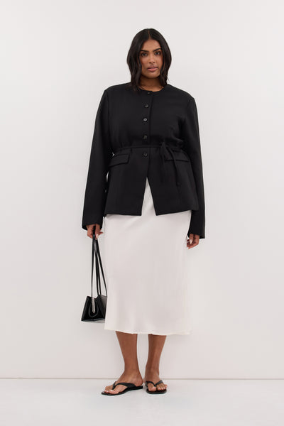 Shanaya wearing ARELIA WHITE CUPRO MIDI SKIRT