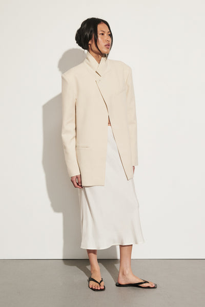 Zoe wearing ARELIA WHITE CUPRO MIDI SKIRT