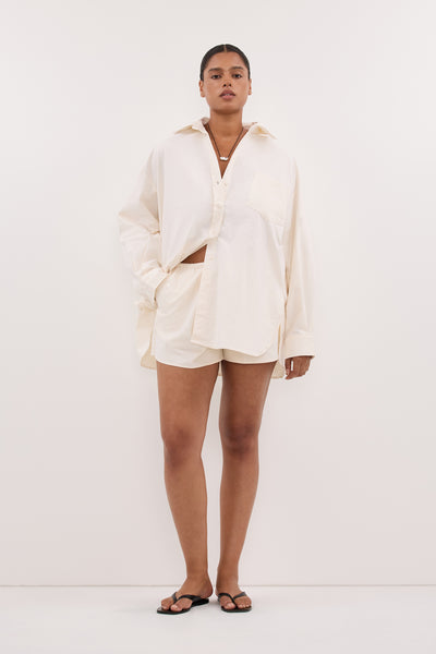 Amanda wearing RHEA CREAM COTTON DRAWSTRING SHORT