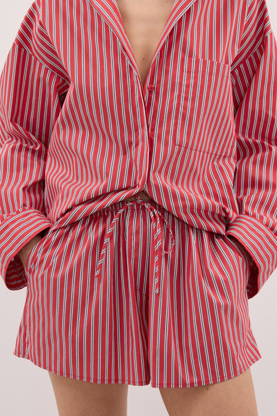 Shanaya wearing MISHA RED STRIPE SHORT