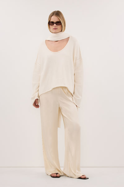 Zoe wearing MYA CREAM SATIN PANT