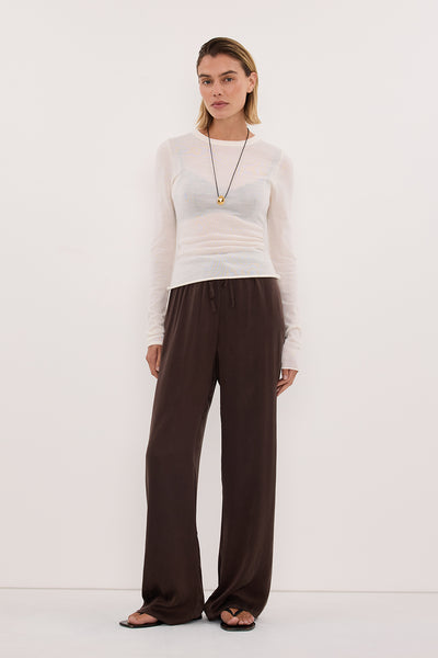 Joanna wearing PERCY BITTER CHOC SILK PANT