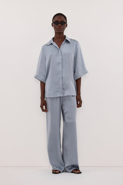 Joanna wearing PERCY DUSTY BLUE SILK PANT