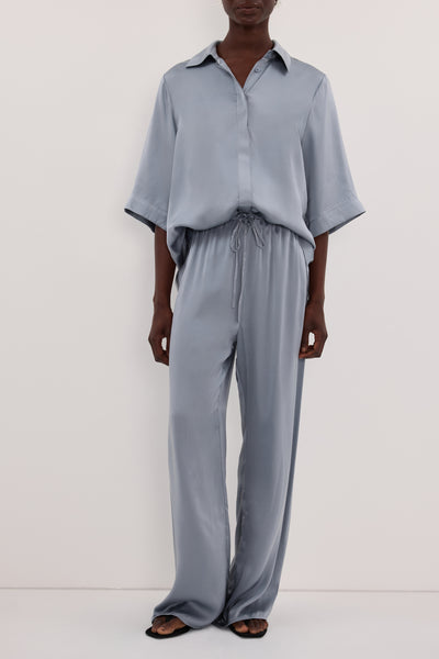 Joanna wearing PERCY DUSTY BLUE SILK PANT