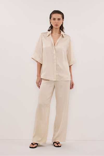 Stas wearing PERCY SANDSTONE SILK PANT