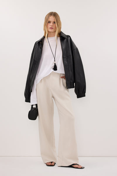 Zoe wearing ELLE BONE PANT