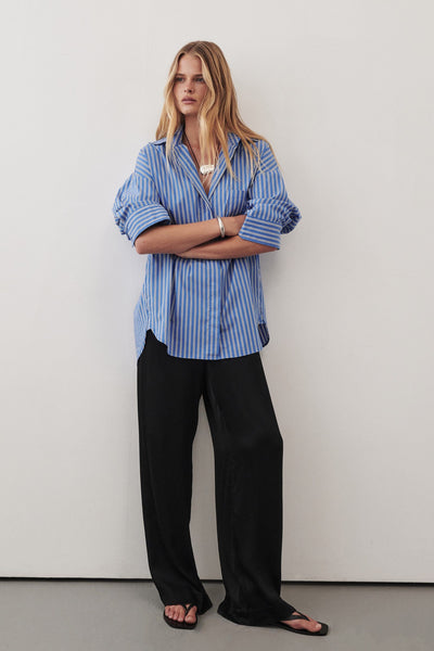 Zoe wearing MONICA BLACK SATIN PANT