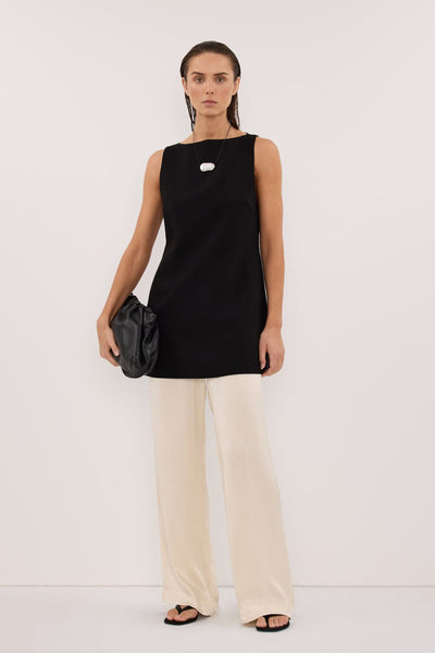 Stas wearing MONICA CREAM SATIN PANT
